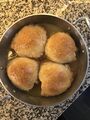 Baked apple dumplings in a pan