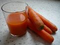 Glass of juice and carrots