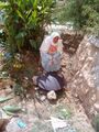 Woman Baking Bread on Saj Oven