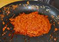 Curry paste fried with coconut cream