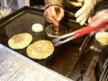 A delicious hotteok filled with sweet syrup.