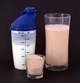 A protein shake, commonly used as a bodybuilding supplement.