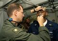 U.S. Navy Flight Surgeon performs an eye examination