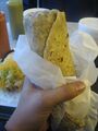 A burrito from Papa Chevo's, representing the fusion of flavors in North American cuisine.