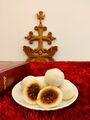 Kozhukatta – A South Indian rice dumpling filled with coconut and jaggery.